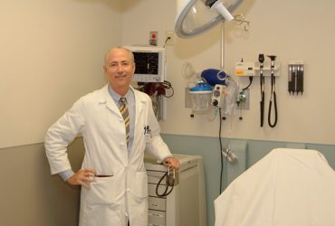 High-quality medical professional in a hospital or clinic setting.