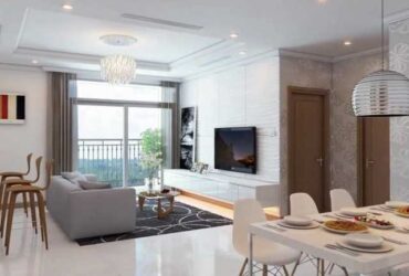 Modern living room with stylish furniture and large windows, perfect for family gatherings and entertainment.